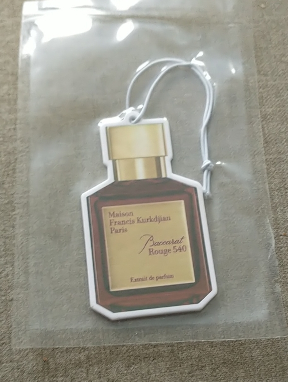 Baccarat Air Freshener Tag in Gold and Brown by Baccarat